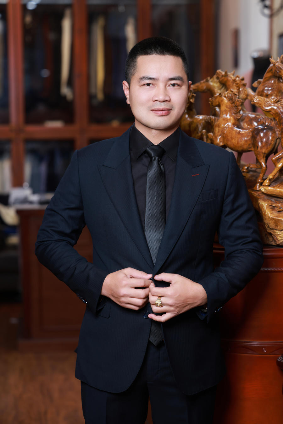 Atelier — bespoke suit on mannequin
